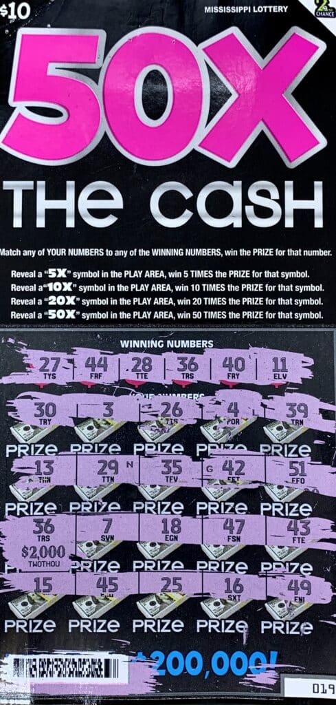 An Olive Branch woman won $2,000 on a 50x the Cash scratch-off game purchased from Campcreek Food & Fuel Inc on Germantown Rd., Olive Branch.